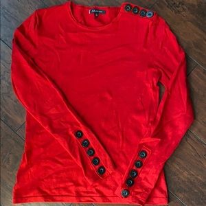 Anne Klein Red shirt with black button details.